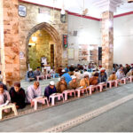 Madrasa students reciting Holy Quran in a mosque during Holy Fasting Month of Ramzan