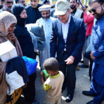 Prime Minister Muhammad Shehbaz Sharif distributes relief items among the affectees of torrential rains
