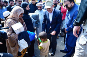 Prime Minister Muhammad Shehbaz Sharif distributes relief items among the affectees of torrential rains