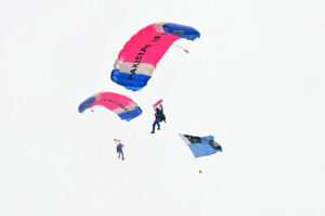 Pakistan Army paratroopers demonstrate their skills during free dive participating in Pakistan Day 2024 parade ceremony, at Shakarparian Parade Ground