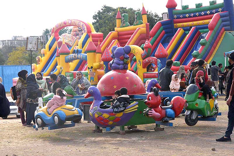 Children are enjoying at playing area in Jillani Park during Jashan-e-Baharan Festival