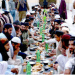 Volunteers arranging Iftar for people at Darwesh Masjid during Holy Fasting Month of Ramzanul Mubarak