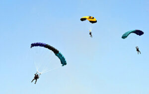 Pakistan Army paratroopers demonstrate their skills during free dive participating in Pakistan Day 2024 parade ceremony, at Shakarparian Parade Ground