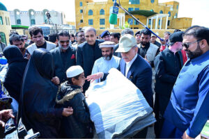 Prime Minister Muhammad Shehbaz Sharif distributes relief items among the affectees of torrential rains