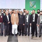 President Dr. Arif Alvi in a group photo with the organizers and participants of the building Materials Exhibition and conference