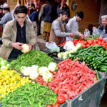People buying vegetables in first day of Ramadan at Vegetable Market