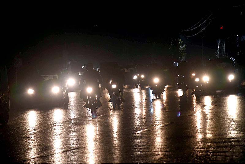 A view of reflection of vehicles headlight on road after rain that experienced the Provincial Capital