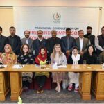 Member National Commission the Rights of Child Ms. Nadia Bibi in a group photo with other participants during Provincial Consultation meeting on Free and Compulsory Education in Pakistan