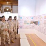 Directorate Commander ANF Sindh Brigadier Umer Farooq and others viewing Drug Awareness Poster Competition' among different schools of Karachi at Sadequain Gallery Frere Hall.
