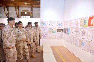 Directorate Commander ANF Sindh Brigadier Umer Farooq and others viewing Drug Awareness Poster Competition' among different schools of Karachi at Sadequain Gallery Frere Hall. 