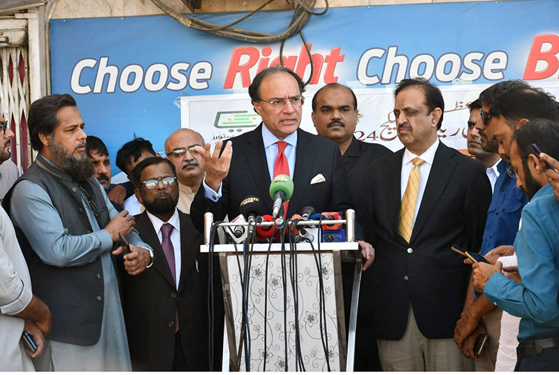 Federal Minister for Finance & Revenue, Muhammad Aurangzeb talking to media during his visit to Utility Stores Corporation to oversee the implementation of the enhanced Ramadan Relief Package.