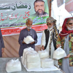 People buying sugars from Ramadan Sasta Bazaar established near Joint Road