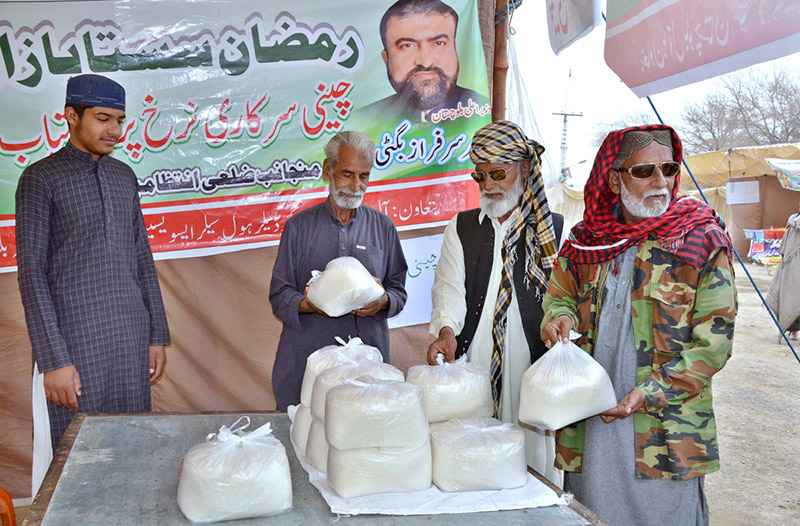 People buying sugars from Ramadan Sasta Bazaar established near Joint Road