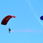 Pakistan Army paratroopers demonstrate their skills during free dive participating in Pakistan Day 2024 parade ceremony, at Shakarparian Parade Ground