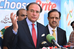 Federal Minister for Finance & Revenue, Muhammad Aurangzeb talking to media during his visit to Utility Stores Corporation to oversee the implementation of the enhanced Ramadan Relief Package.