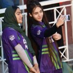 Spectators taking selfi while watching T20 cricket match between Islamabad United and Peshawar Zalmi during Pakistan Super League (PSL) season nine at Rawalpindi Cricket Stadium