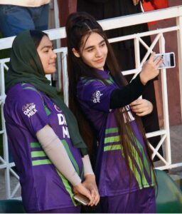 Spectators taking selfi while watching T20 cricket match between Islamabad United and Peshawar Zalmi during Pakistan Super League (PSL) season nine at Rawalpindi Cricket Stadium