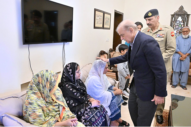 Prime Minister Muhammad Shehbaz Sharif offers condolences to the family of Lt. Colonel Syed Kashif Ali Shaheed at their residence in Chaklala