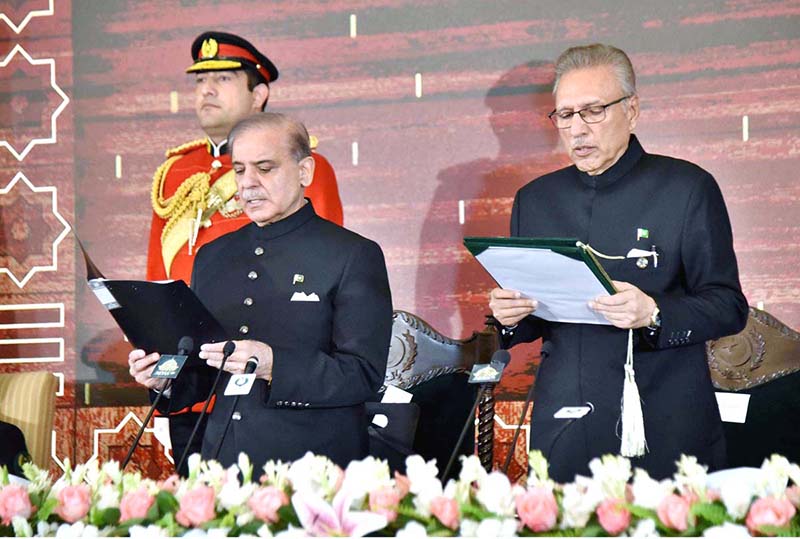 President Dr. Arif Alvi administering the oath of office to Mian Muhammad Shehbaz Sharif as the Prime Minister of the Islamic Republic of Pakistan at Aiwan-e-Sadr