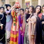 Students are performing in a singing competition at IMCG F-11/3