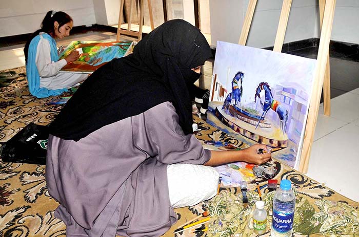 Students participating in painting competition organized by the Punjab Arts Council Multan