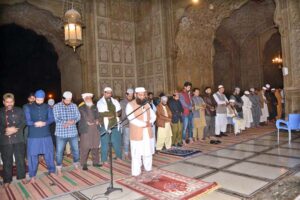 People praying first Tarawih in congregation in Badshahi Masjid as the crescent moon of Ramazan ul Mubarak sighted in the country