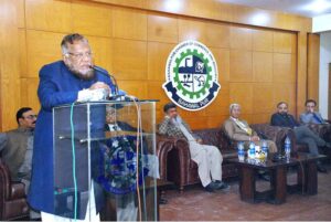 Federal Ombudsman for Tax Dr. Asif Mahmood Jah, watching photographs at Bahawalpur Chamber of Commerce and Industry