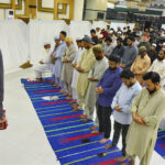 People praying first Tarawih in congregation in a local banquet as the crescent moon of Ramazan ul Mubarak sighted in the country