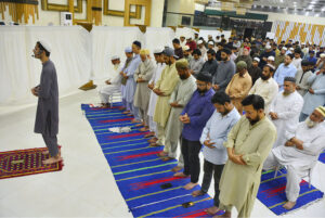People praying first Tarawih in congregation in a local banquet as the crescent moon of Ramazan ul Mubarak sighted in the country