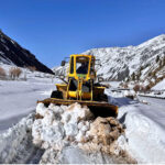 Heavy machineries being used to remove snow from the blocked road of Mir Malik area Astore Valley by the staffer of Gilgit-Baltistan Disaster Management Authority as the last heavy snow fall and rain hit the area and caused land sliding