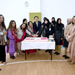 Consul General of the People's Republic of China in Karachi Mr. Yang Yundong cutting cake during International Women’s Day celebration ceremony at Consulate General of China.