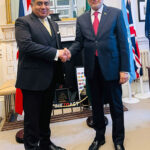 Foreign Minister Mohammad Ishaq Dar shakes hand with UK Minister of State for South Asia and Commonwealth, Lord Tariq Ahmad