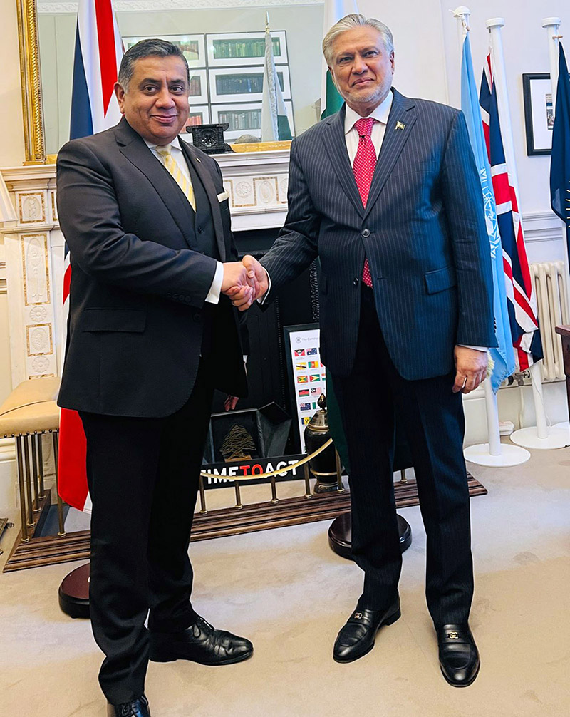 Foreign Minister Mohammad Ishaq Dar shakes hand with UK Minister of State for South Asia and Commonwealth, Lord Tariq Ahmad