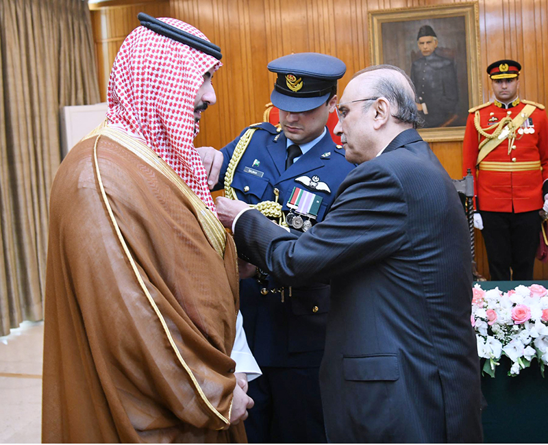 President of Pakistan Asif Ali Zardari conferring the award of Nishan-i-Pakistan on the Minister for Defense of the Kingdom of Saudi Arabia (KSA), Prince Khalid bin Abdulaziz Al-Saud in recognition of his services towards strengthening Pak-KSA bilateral cooperation during a special investiture ceremony, at Aiwan-e-Sadr