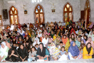Christian community members performing religious rituals on Good Friday Day at Sun Church.
