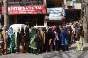 Women in long queues at Davies Road to receive cash payment of BISE programm