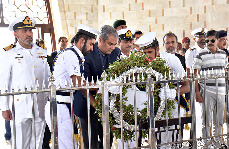 The Federal Minister for Interior Syed Mohsin Raza Naqvi lays flower wrath at the mausoleum of Quaid-e-Azam Mohammed Ali Jinnah