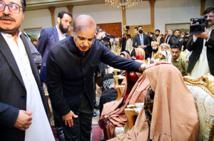 Prime Minister Muhammad Shehbaz Sharif interacting with the families of the deceased and injured in the wake of recent torrential rains and heavy snowfall