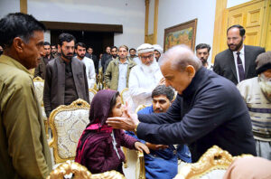 Prime Minister Muhammad Shehbaz Sharif interacting with the families of the deceased and injured in the wake of recent torrential rains and heavy snowfall