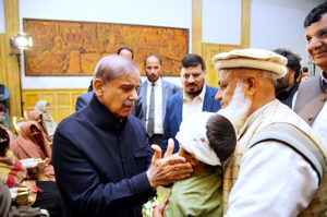 Prime Minister Muhammad Shehbaz Sharif interacting with the families of the deceased and injured in the wake of recent torrential rains and heavy snowfall