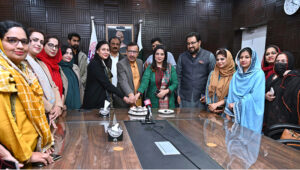 Managing Director Associated Press of Pakistan Muhammad Asim Khichi along with women staffers cutting cake to celebrate the International Women’s Day at APP Headquarters