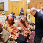 Prime Minister Muhammad Shehbaz Sharif interacting with the families of the deceased and injured in the wake of recent torrential rains and heavy snowfall