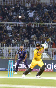 Quetta-Gladiators players celebrate the wicket of Peshawar Zalmi batter Saim Ayub during the Pakistan Super League (PSL) Twenty20 cricket match at the Rawalpindi Cricket Stadium