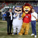 Owners of Islamabad United and Multan Sultans posing with their team logos before the Pakistan Super League (PSL) Twenty20 final cricket match at the National Stadium