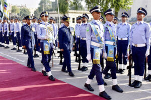 On Pakistan Day, Air Vice Marshal Tariq Mehmood Ghazi is offering Fatiha after laid floral wreath at the shrine of Allama Muhammad Iqbal