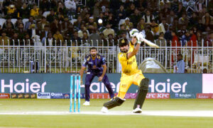 Quetta-Gladiators players celebrate the wicket of Peshawar Zalmi batter Saim Ayub during the Pakistan Super League (PSL) Twenty20 cricket match at the Rawalpindi Cricket Stadium
