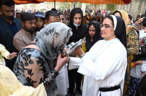 Bishop of Fatima Church performing religious rituals on Good Friday Day.