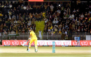 Quetta-Gladiators players celebrate the wicket of Peshawar Zalmi batter Saim Ayub during the Pakistan Super League (PSL) Twenty20 cricket match at the Rawalpindi Cricket Stadium
