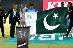 Owners of Islamabad United and Multan Sultans posing with their team logos before the Pakistan Super League (PSL) Twenty20 final cricket match at the National Stadium