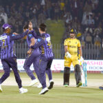 Quetta-Gladiators players celebrate the wicket of Peshawar Zalmi batter Saim Ayub during the Pakistan Super League (PSL) Twenty20 cricket match at the Rawalpindi Cricket Stadium